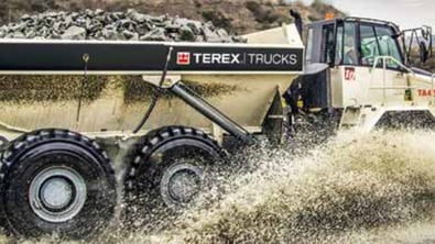 Terex Truck driving through a puddle
