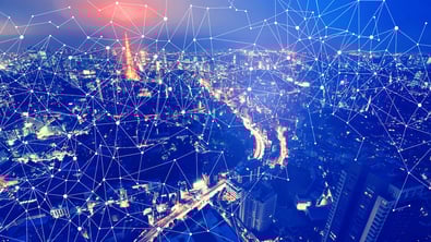 Network image over Paris skyline at night