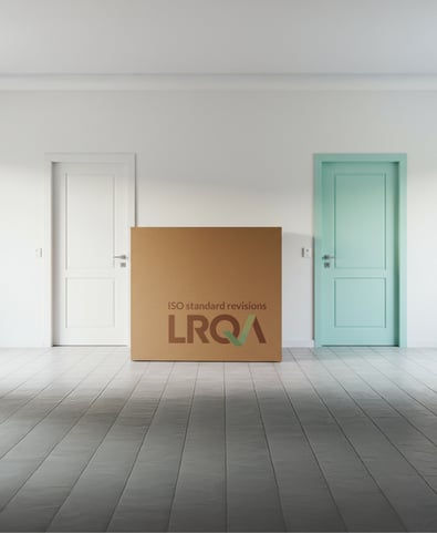 LRQA branded box in a room with 2 doors