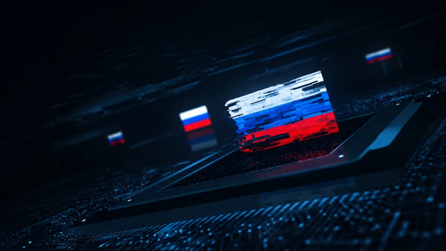 Laptop displaying cyber code on a Russian flag, representing Russian cyber threats and cybersecurity.