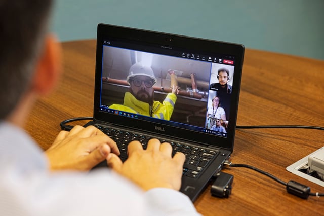 Group video call on a laptop